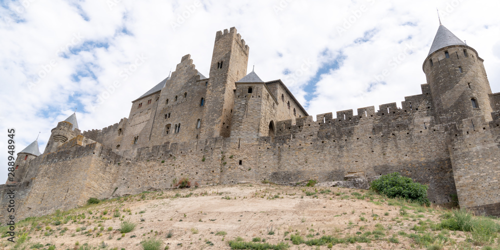 french medieval Carcassonne fortress in UNESCO list of World Heritage Sites in web banner template header