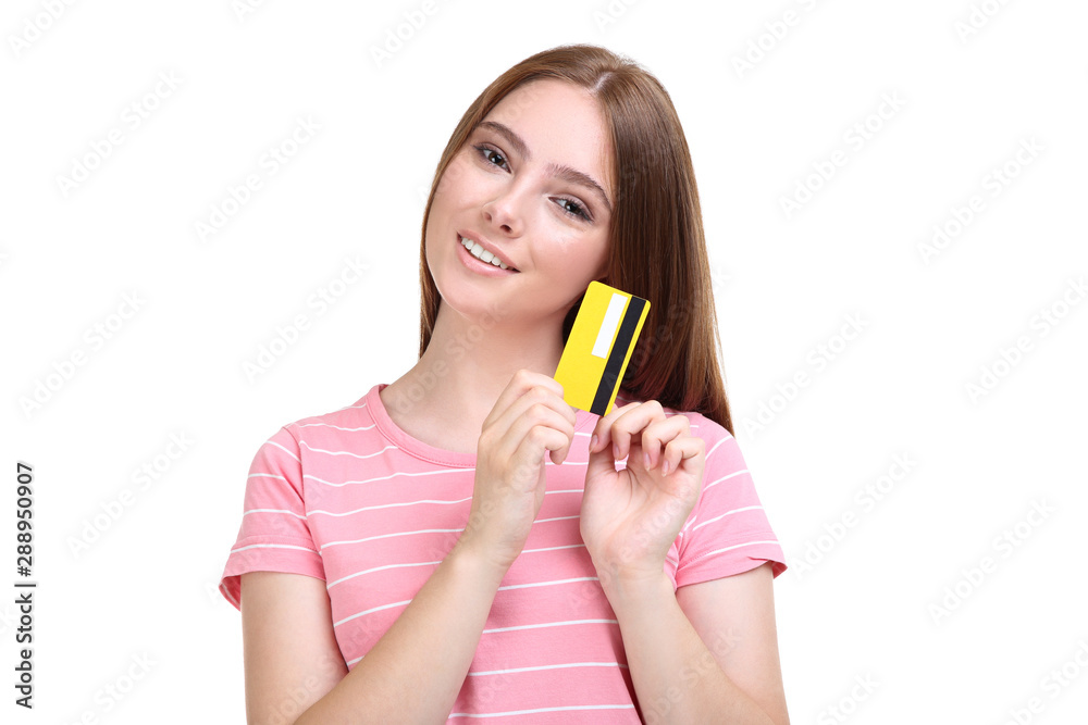 Young woman holding credit card on white background Young woman holding credit card on white background