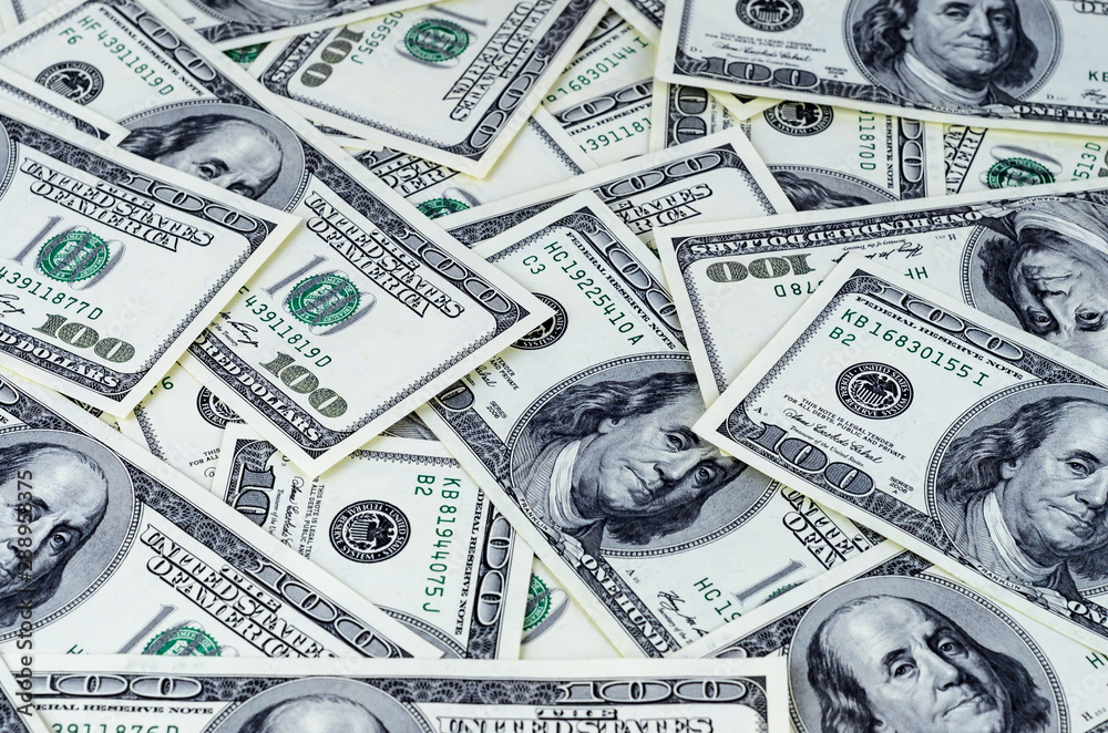 Fototapeta premium Background with united states hundred dollar notes. Money texture