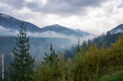 mountain landscape in the clouds, Canada road trip in fall