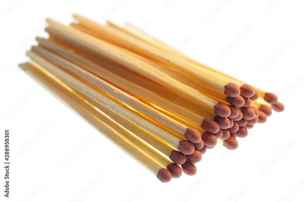 Close-up of long matchsticks on a white background