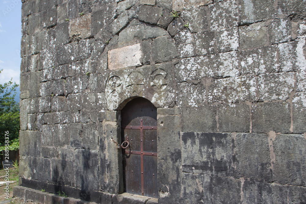 custom made wallpaper toronto digitalAn old iron door in an old iron wall. Doorway of a thirteenth century medieval castle