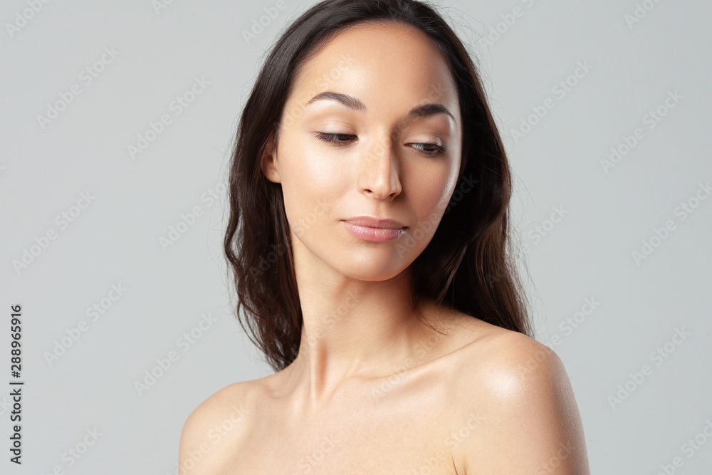 Young beautiful woman with clean perfect skin close-up. Young beautiful woman with clean perfect skin close-up.
