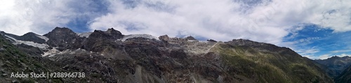 Panormic view in the high mountains - glaciers and peaks - Grand Paradiso mountains   Valnontey  Aosta Valley  Italy
