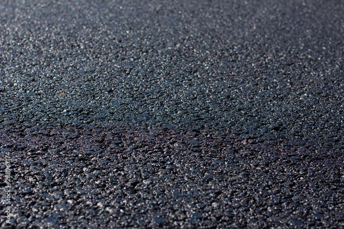 Asphalt road close-up, road works