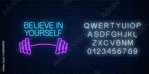 Believe in yourself - glowing neon inscription phrase with barbell and alphabet. Motivation quote in neon style.