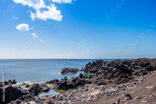 Amazing landscape view to volcanic coastline near ocean hot springs natural pool of Ferraria (Piscina da Ponta da Ferraria), São Miguel Island, Azores, Portugal © Vitor Miranda
