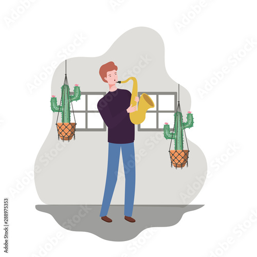 young man with saxophone and houseplants on macrame hangers of background