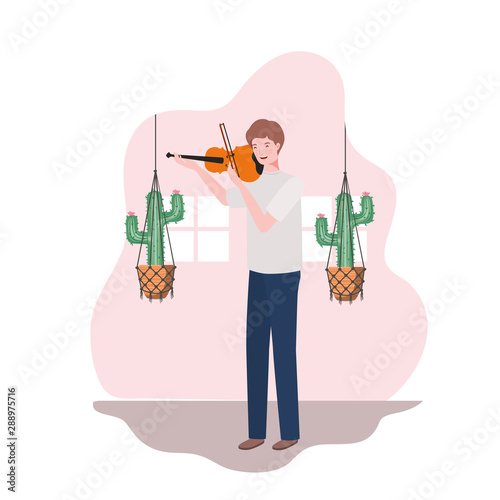 young man with fiddle and houseplants on macrame hangers of background