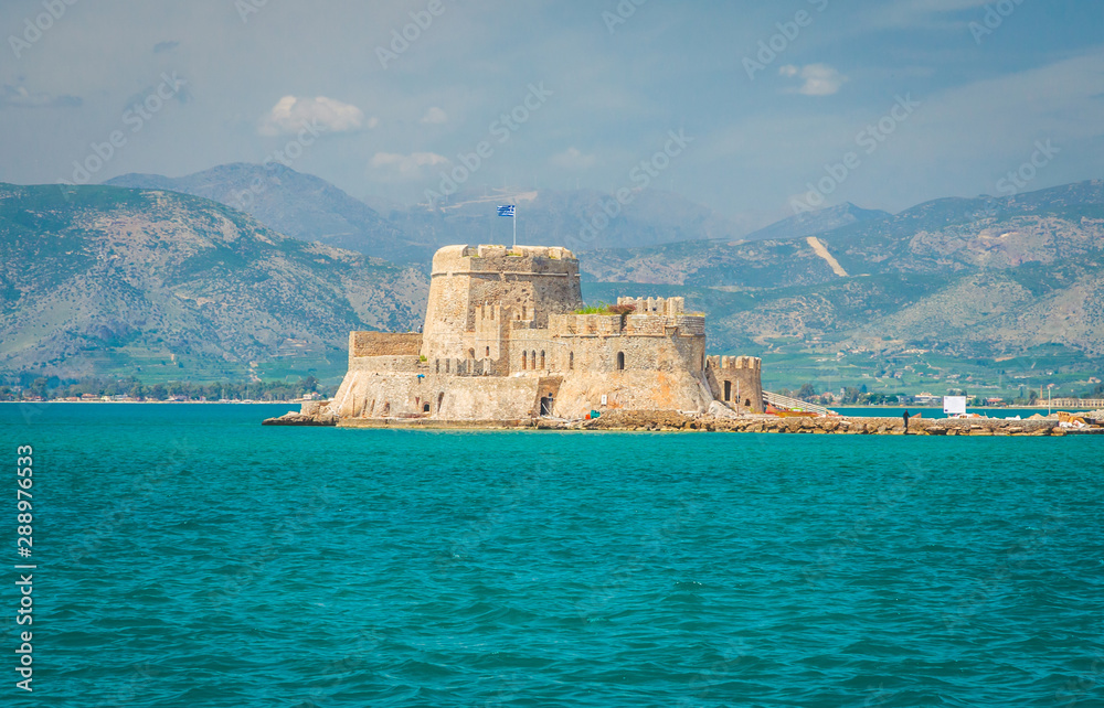 Bourtzi castle on the water in beautiful city Nafplio, Greece Bourtzi castle on the water in beautiful city Nafplio, Greece