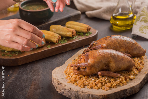 Oriental Roasted Hamam Meal with Mahshy and stuffed food photo