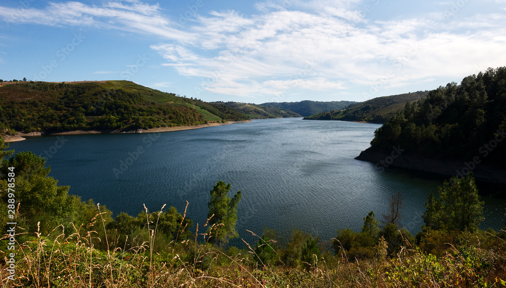 Panoramic view of the reservoir of Belesar in Ribeira Sacra area, Galicia, Spain. Winemaking area surrounding Miño river at Lugo province.