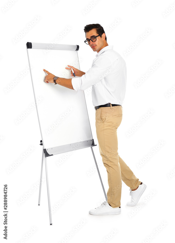 Professional business trainer near flip chart on white background Professional business trainer near flip chart on white background