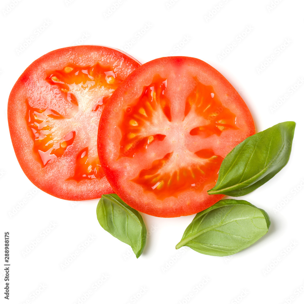 Slices of tomato and basil leaves isolated on white background. Top view, flat lay.