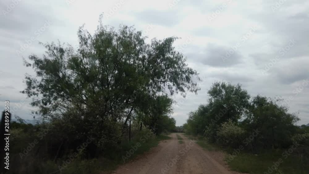 Driving slowly on a dirt road Driving slowly on a dirt road