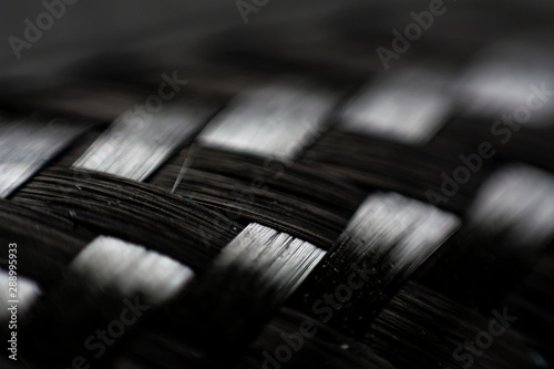 composite product dark carbon fiber macro zoom close up