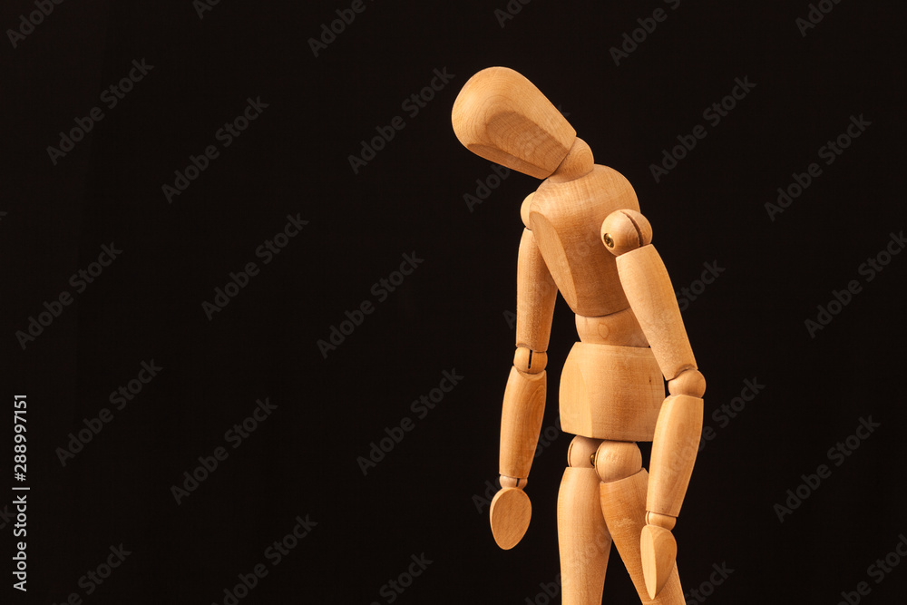 sad wooden mannequin black background sad wooden mannequin black background