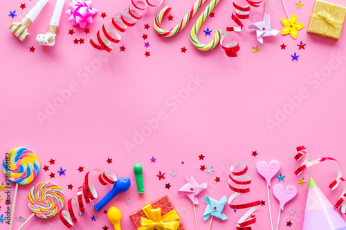 party time frame with decorations on pink background top view mock up