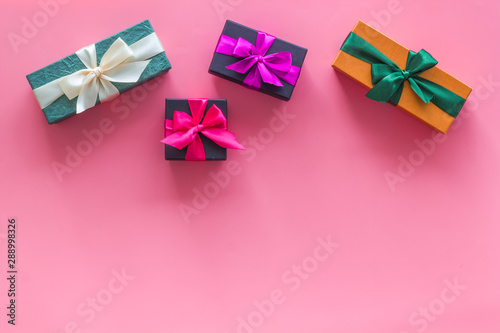 gifts frame on pink background top view mock up