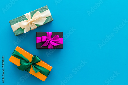frame from boxes with presents on blue background top view mockup © 9dreamstudio