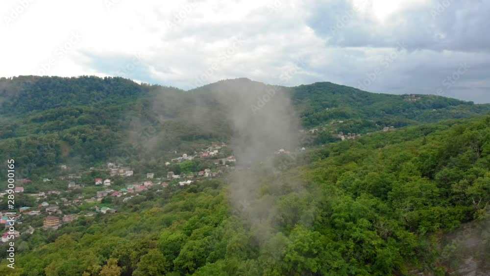 Flying in a mountain gorge. Aerial survey