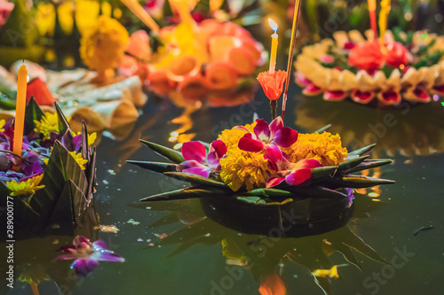 Loy Krathong festival, People buy flowers and candle to light and float on water to celebrate the Loy Krathong festival in Thailand photo