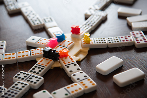 Mexican Train Game showing dominoes, trains and play setup.  A great game for family or friends.
