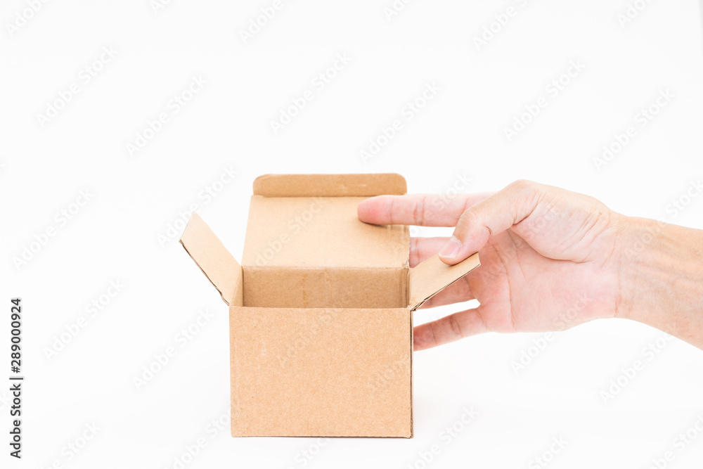 Man hand holding brown paper box on white background Man hand holding brown paper box on white background