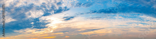 Fototapeta Naklejka Na Ścianę i Meble -  Dramatic vibrant color with beautiful cloud of sunrise and sunset on a cloudy day. Panoramic image.
