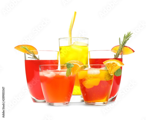 Different tasty cocktails on white background