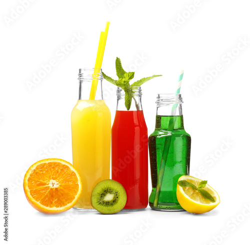Different tasty cocktails on white background