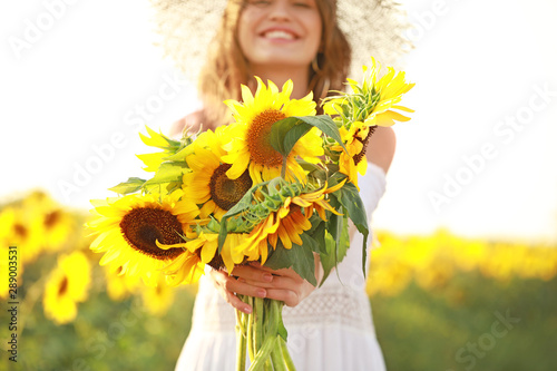 Beautiful young woman in su...