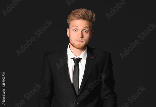 Surprised young businessman...