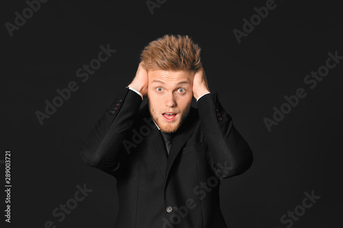 Shocked young businessman o...