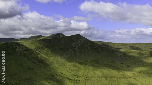 Motion Timelapse of clouds moving over the Brecon Beacons. Taken from Fan Y Big towards Cribyn with Pen Y Fan and Corn Du in the background. Wales, UK photo