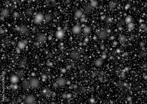 Christmas background with snowflakes. Snow in motion. Winter background
