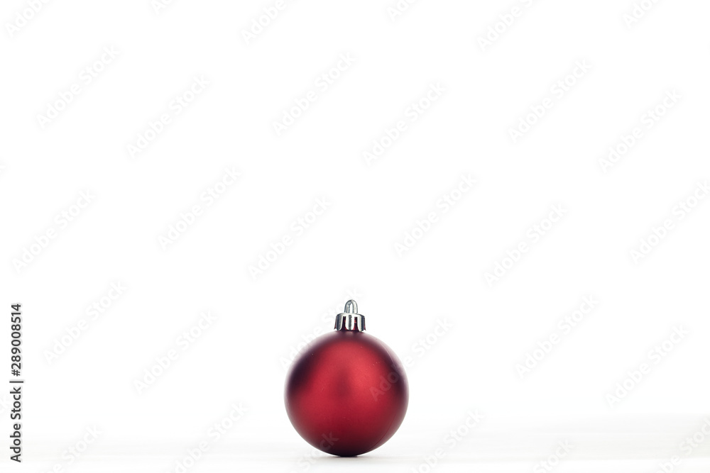 red christmas bauble on white background red christmas bauble on white background