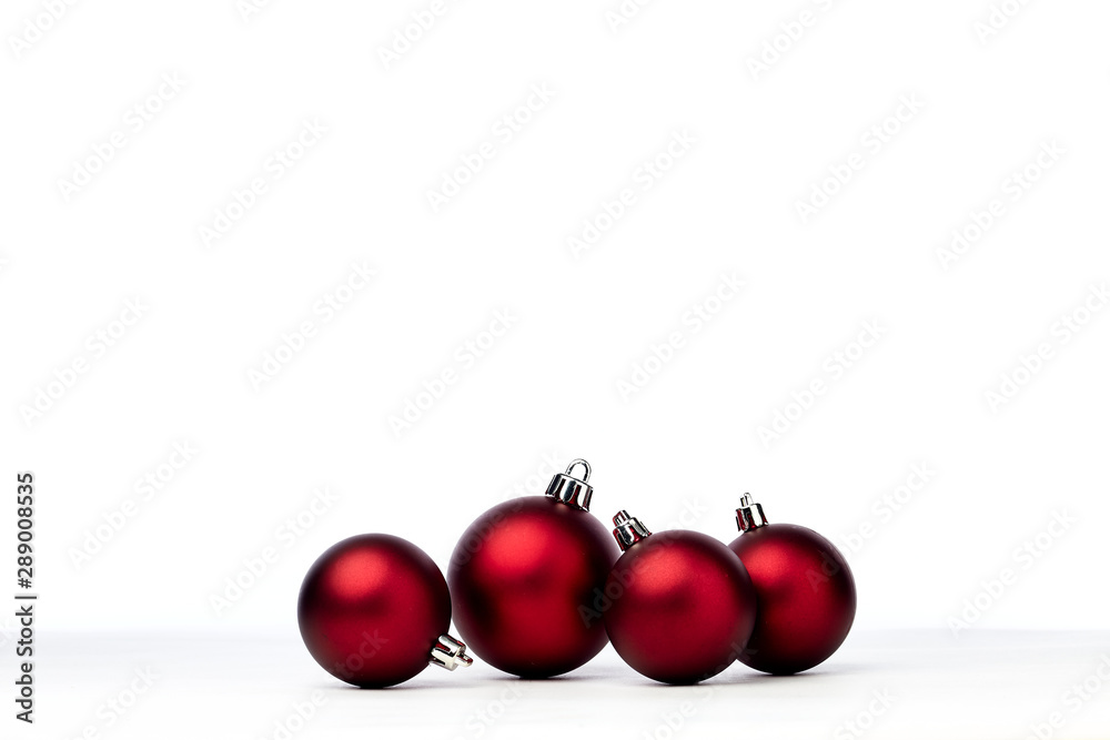 red christmas balls isolated on white background red christmas balls isolated on white background