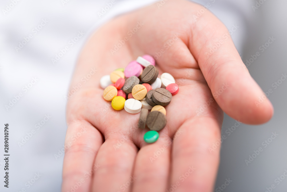 Photo of doctor prescribes pills and antibiotics Photo of doctor prescribes pills and antibiotics