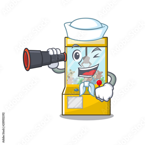 Sailor with binocular crane game mascot on a cartoon