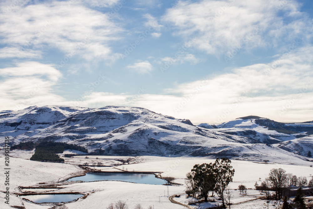 hills and mountains covered in snow fall hills and mountains covered in snow fall