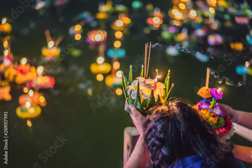 Loy Krathong festival, People buy flowers and candle to light and float on water to celebrate the Loy Krathong festival in Thailand photo