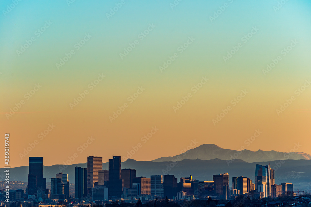 Denver skyline against a background of mountains