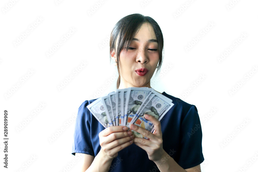Portrait Asia smiling woman with dollars in hand,happy to have money concept. Portrait Asia smiling woman with dollars in hand,happy to have money concept.