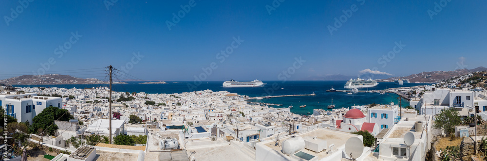 Beautiful white town on seashore and ships
