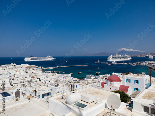 Cruise ships and white town on seashore