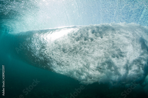 huge powerful wave breaking under water