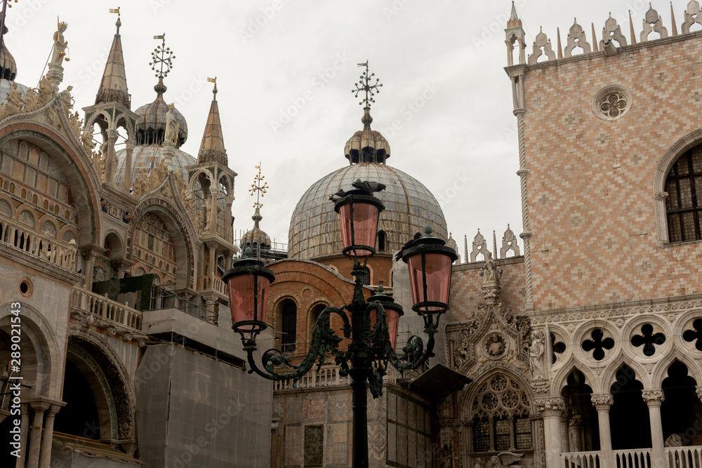 Venetian traditional antique lamps in front of Venice Cathedral - St Mark's Basilica
