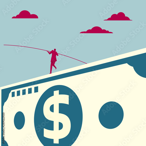 Businessman balancing on dollar banknotes. Isolated on blue background.