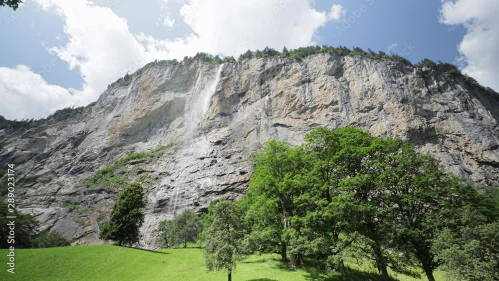 Stunning Waterfall Inside The City in Switzerland with Cinematic Reveal Movement Stunning Waterfall Inside The City in Switzerland with Cinematic Reveal Movement